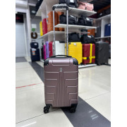 Чемодан 20 дюймов Luyida розовое золото из поликарбоната (ручная кладь)