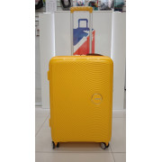 Чемодан 24 дюйма American Tourister Soundbox Spinner желтый из полипропилена